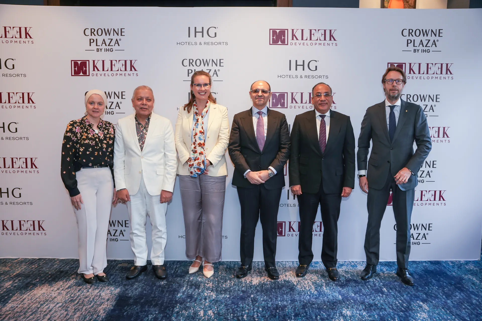 kleek ihg crowne plaza signing ceremony 11 leadership group photo