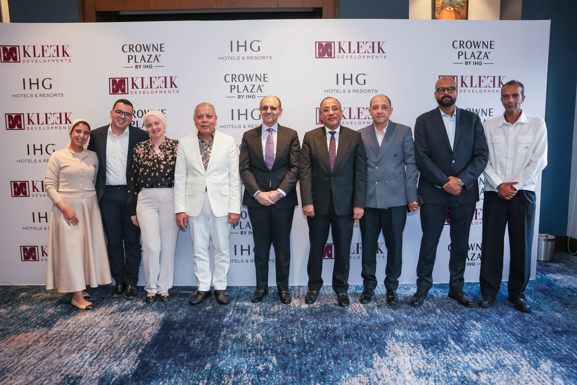 kleek ihg crowne plaza signing ceremony 15 attendees group photo